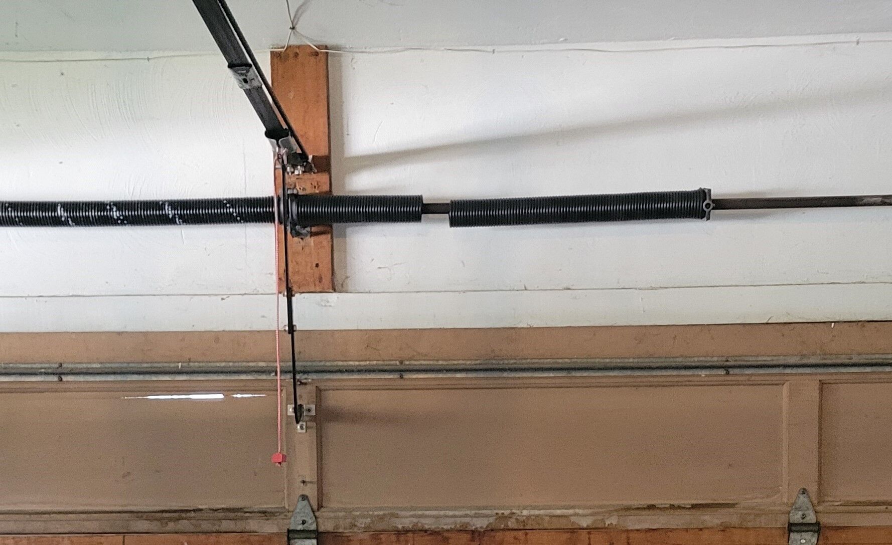 broken garage door spring