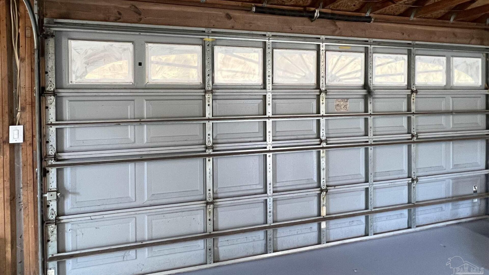 garage door installation A hurricane-rated garage door with reinforcement brackets
