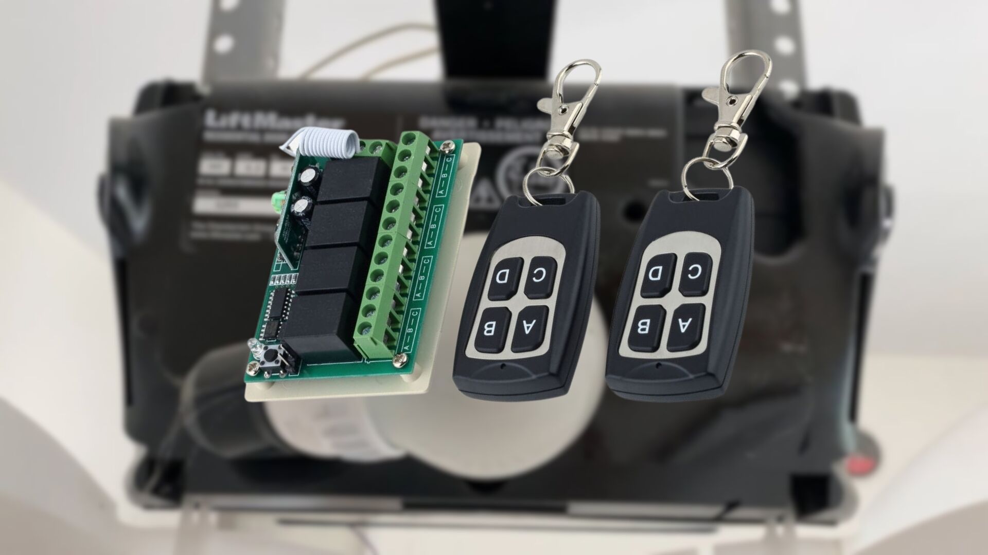 Two remote fobs for garage door light control unit.